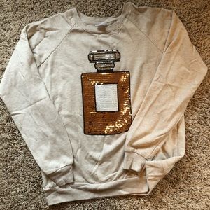 Sequined perfume bottle sweatshirt